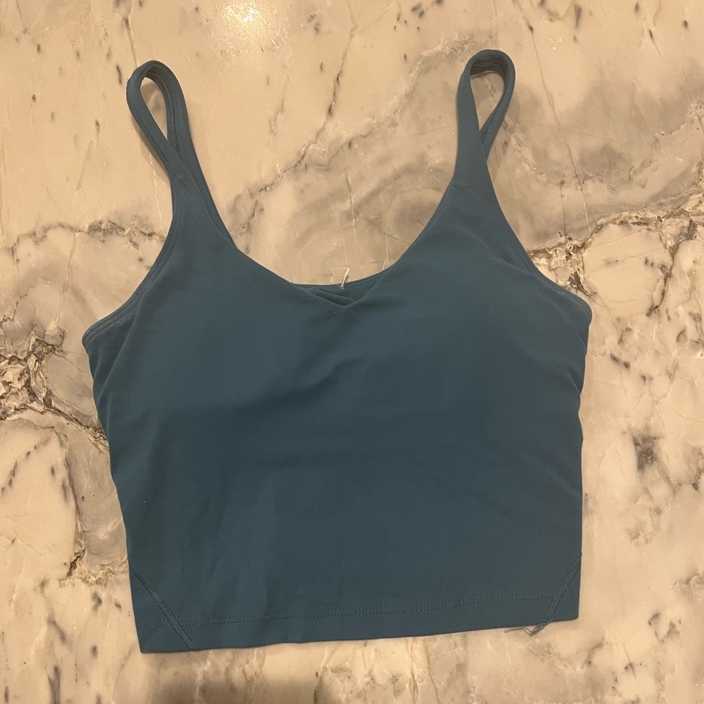 Teal Lulu align top. Size 4.